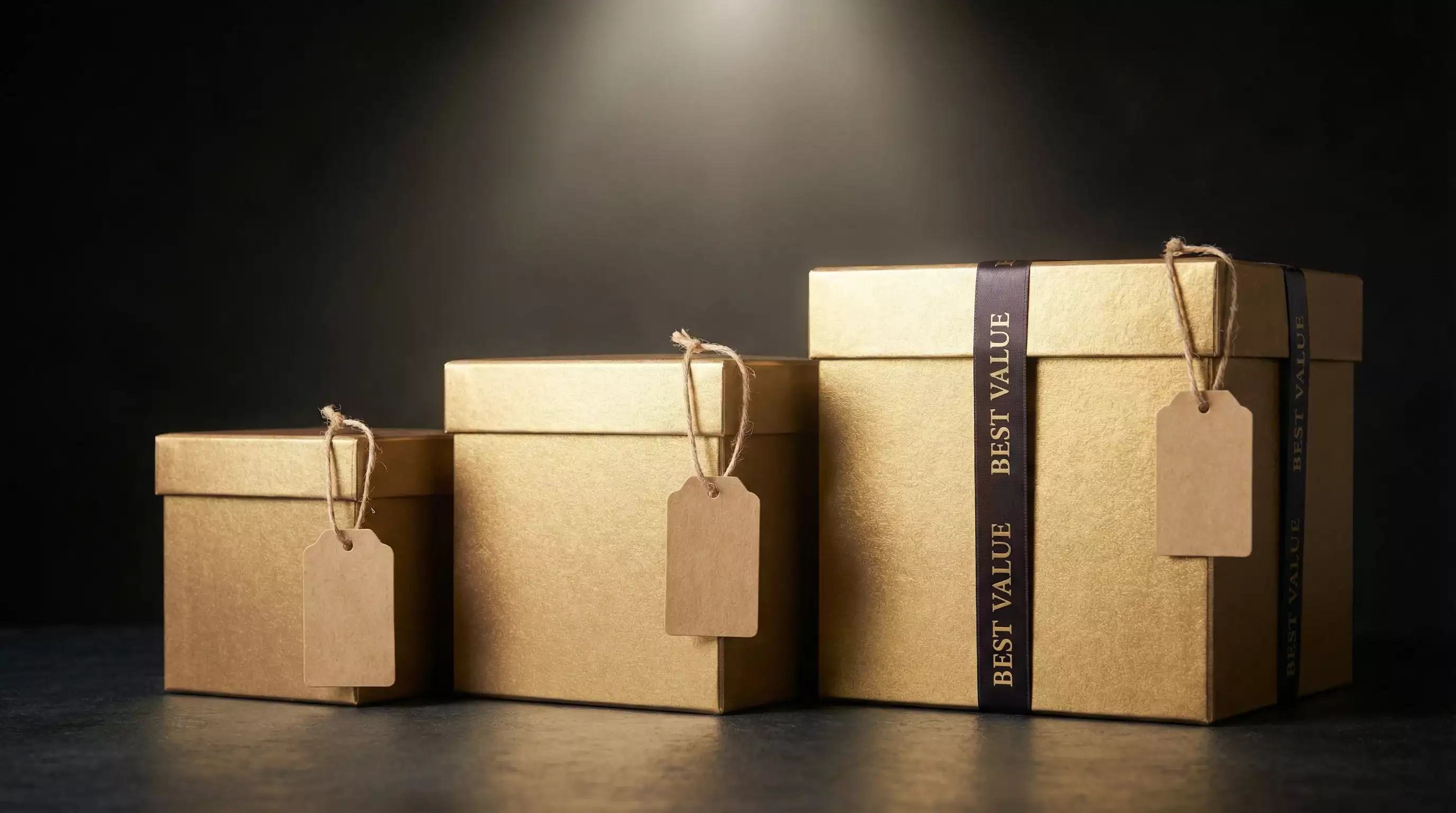 Multiple gold coin package boxes of different sizes with price tags showing value comparison